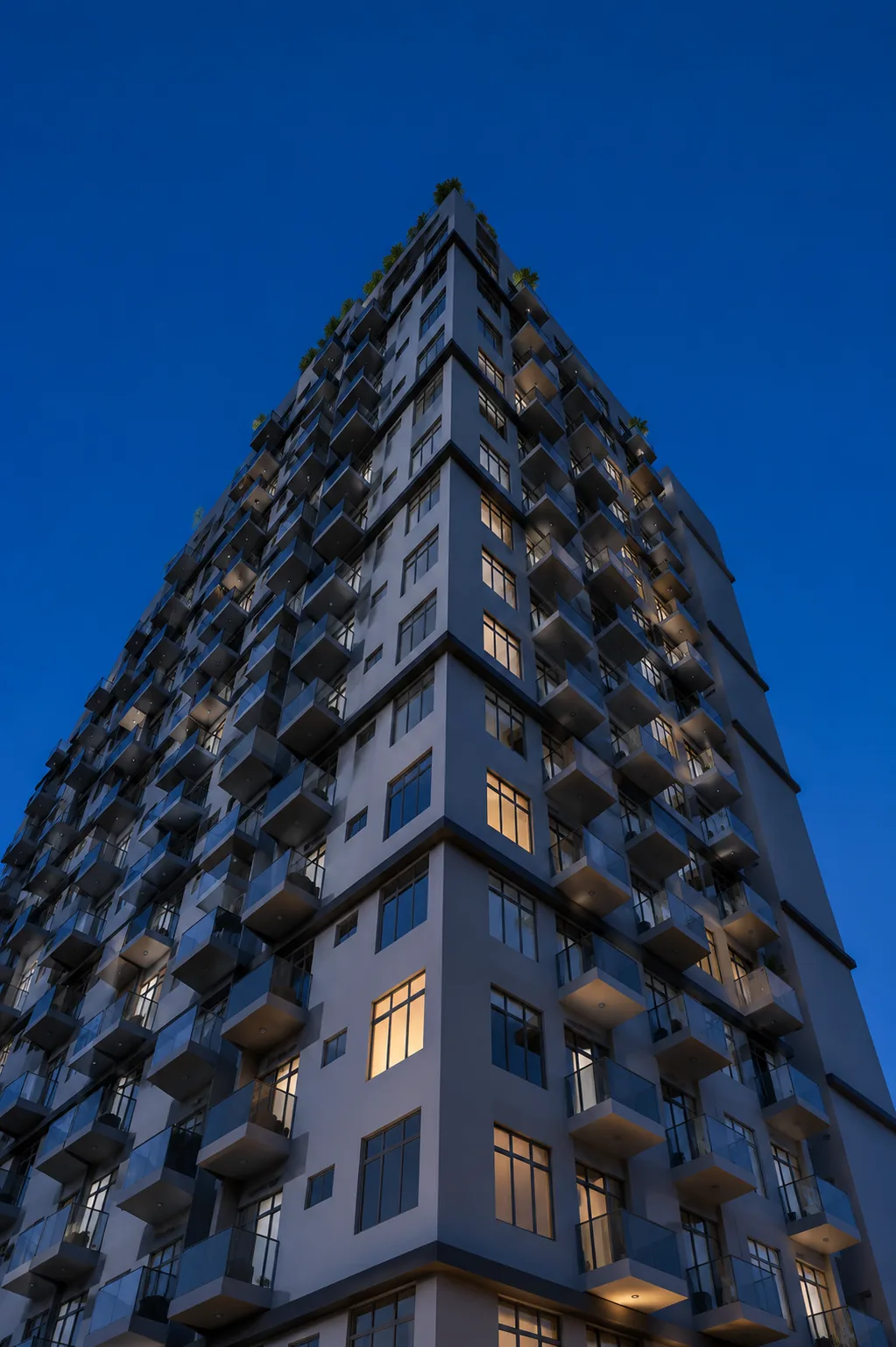 Looking up the Opal Suites tower at dusk